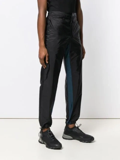 Shop Prada Contrast Stripe Track Pants In Black