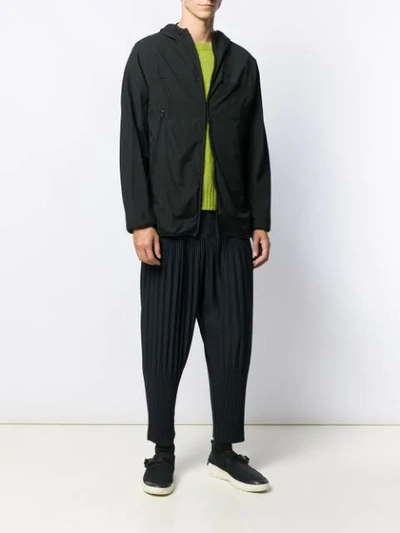 Shop Issey Miyake Pleated Tapered Trousers In Blue