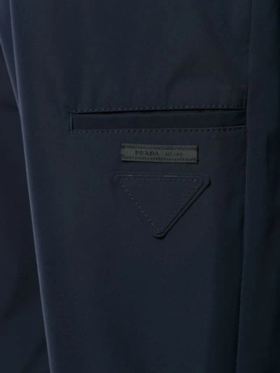 Shop Prada Straight Fit Trousers - Blue