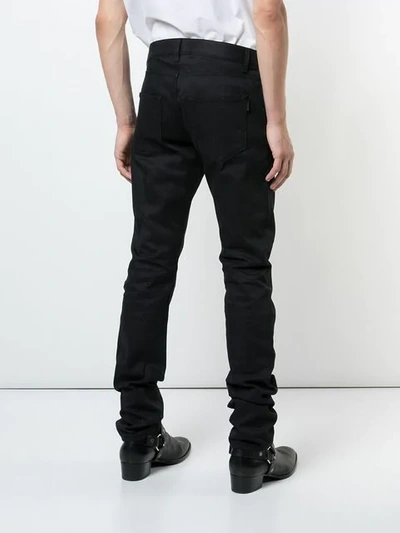 Shop Saint Laurent High Rise Straight Jeans In 1080 - Black
