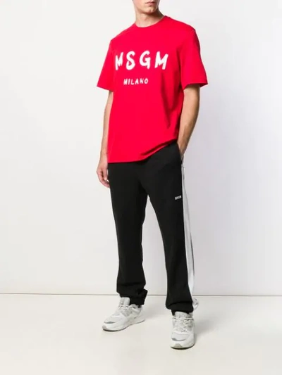 Shop Msgm Side Stripe Track Pants In Black