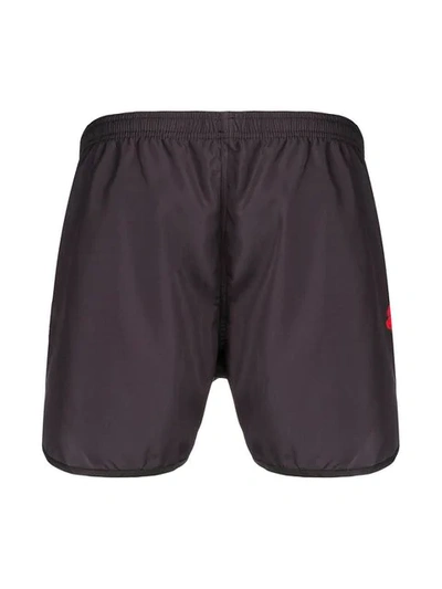 Shop Neil Barrett Flower Swim Shorts - Black