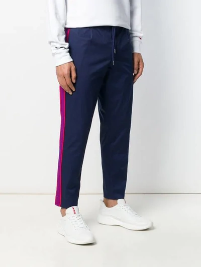 Shop Moncler Stripe Tapered Track Pants In Blue