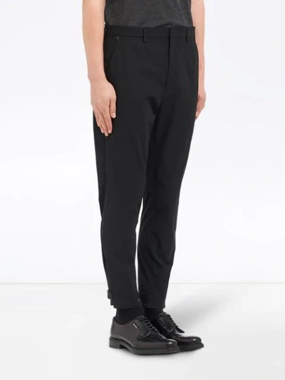 Shop Prada Cropped Techno Stretch Trousers In Black