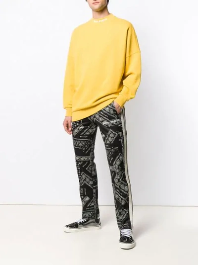 Shop Palm Angels Striped Side Paisley Print Track Pants In Black