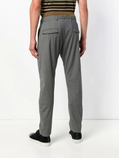 Shop Prada Techno Waist Detail Trousers In Grey