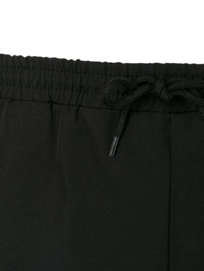 Shop Gucci Contrasting Trim Swim Shorts In Black