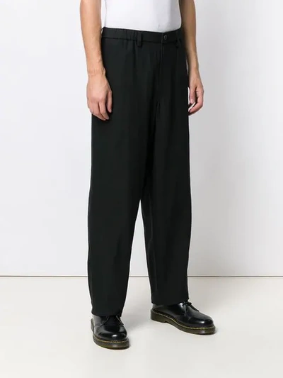 Shop Issey Miyake Formal Loose Fit Trousers In Black