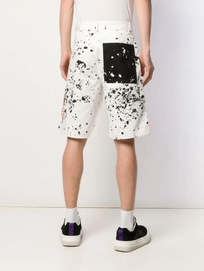 Shop Oamc Splatter Bermuda Shorts In White