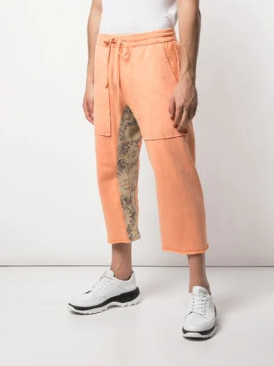 Shop Alchemist Cropped Track Pants In Orange