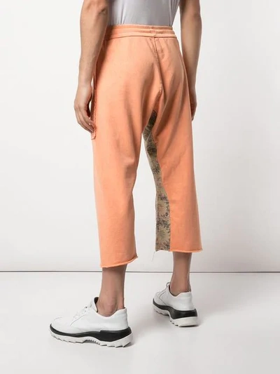 Shop Alchemist Cropped Track Pants In Orange