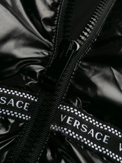 Shop Versace Logo Trimmed Puffer Jacket In Black