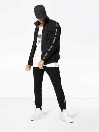 Shop Moschino Logo Sleeve Sport Jacket In Black