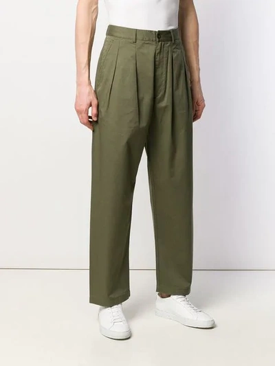 Shop Universal Works Double Pleat Work Trousers In Green