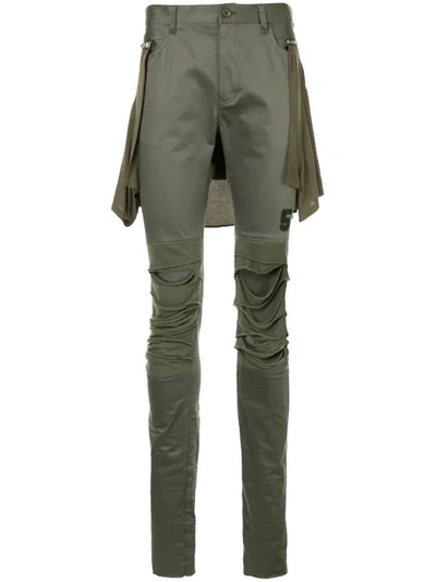 Shop Undercover Distressed Skinny Trousers In Green