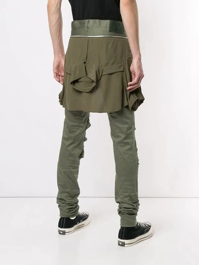 Shop Undercover Distressed Skinny Trousers In Green