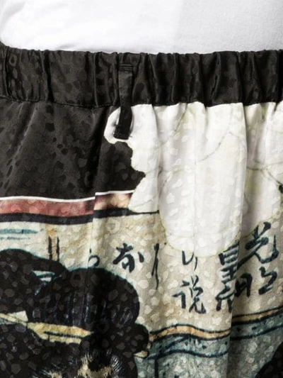 Shop Yohji Yamamoto Graphic Print Wide Leg Trousers In Black