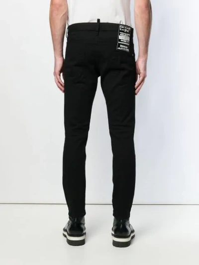 Shop Dsquared2 Distressed Slim Fit Jeans In Black