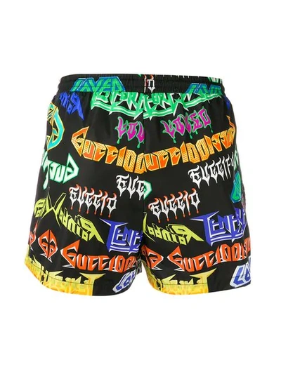 Shop Gucci Metal Logo Print Swim Shorts In Black