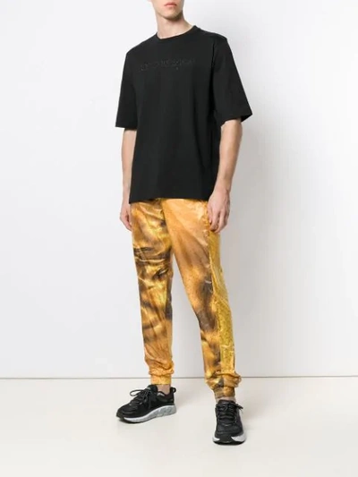 COTTWEILER LOGO PRINT TRACK PANTS - 黄色