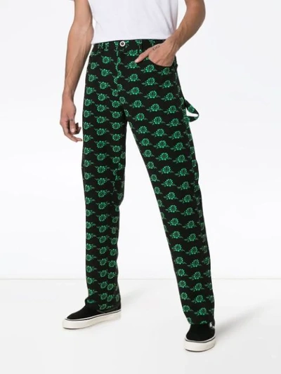 Shop Ashley Williams Rose Print Trousers In Black