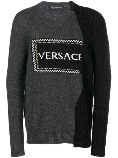 Shop Versace Asymmetric Logo Jumper In Grey