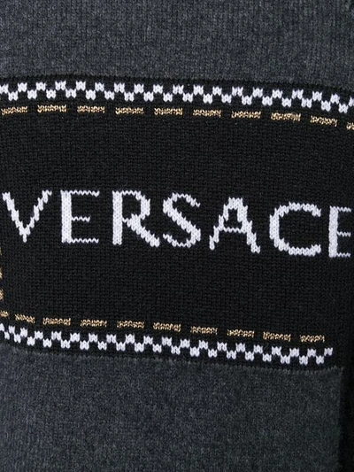 asymmetric logo jumper