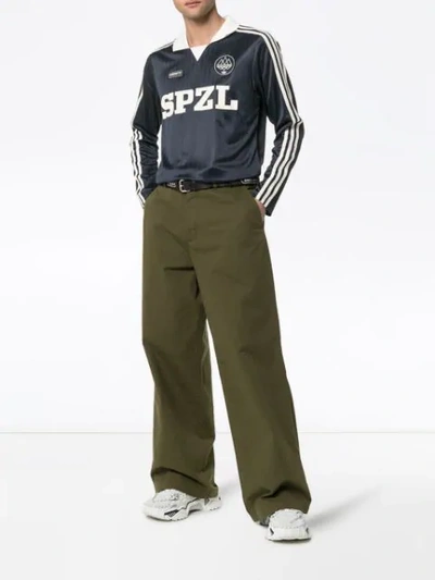 Shop Adidas Originals Spezial Lymwood Striped Polo Shirt In Blue