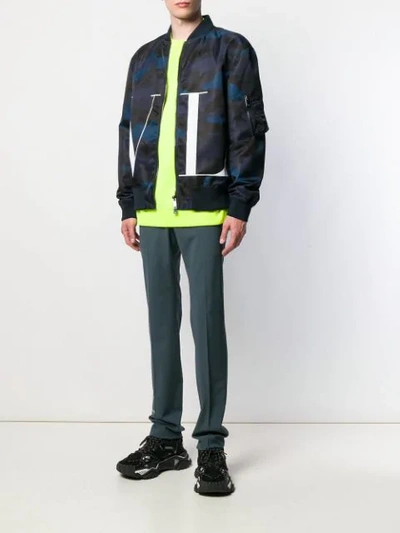 Shop Valentino Vltn Camouflage Print Bomber Jacket In Blue