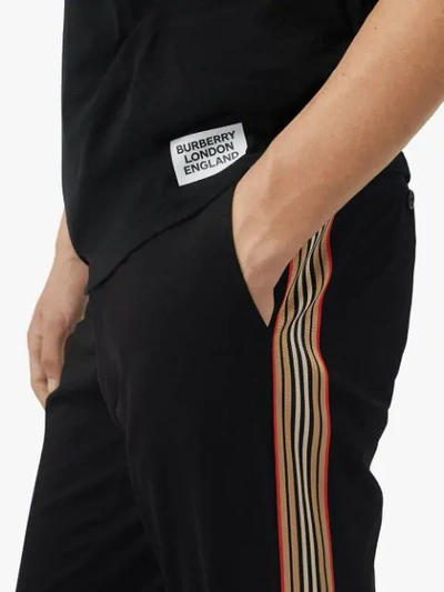 Shop Burberry Slim Fit Icon Stripe Detail Cotton Chinos In Black