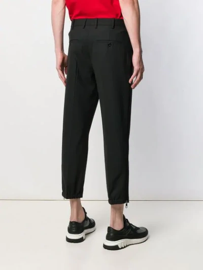 Shop Neil Barrett Cropped Trousers In Black