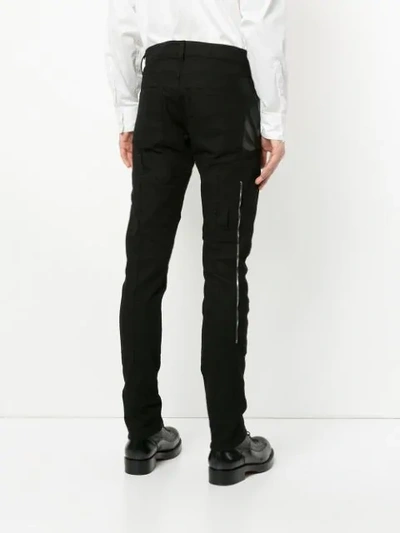 Shop Alexander Mcqueen Zip Patched Trousers - Black