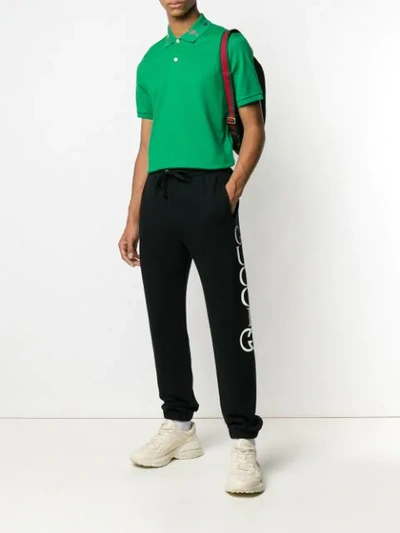 Shop Gucci Embroidered Polo Shirt In Green