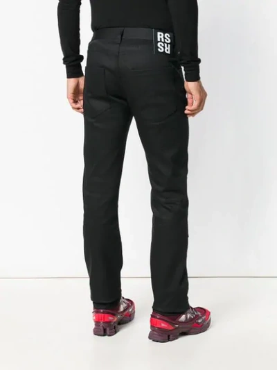 Shop Raf Simons Graphic Print Fitted Jeans In Black