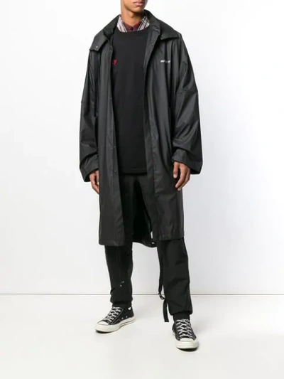 Shop Ambush Zipped Hooded Coat In Black