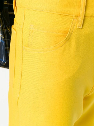 Shop Maison Margiela Straight Cut Jeans In Yellow
