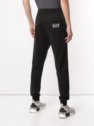 Shop Ea7 Logo Track Pants In Black