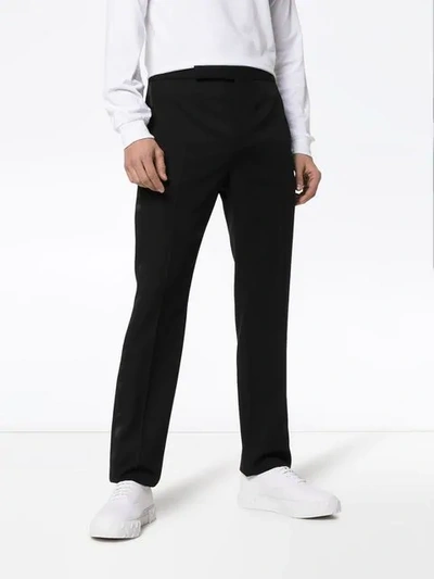 Shop Saint Laurent Tailored Tuxedo Trousers In Black