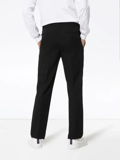 Shop Saint Laurent Tailored Tuxedo Trousers In Black