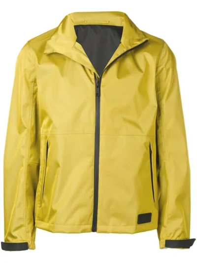 Shop Prada Zipped Jacket In Yellow