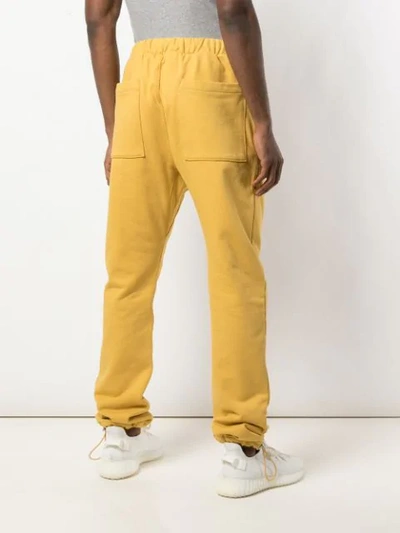 Shop Fear Of God Regular-fit Track Trousers In Yellow