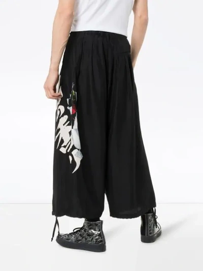 Shop Yohji Yamamoto Wide Leg Cropped Silk Trousers In Black