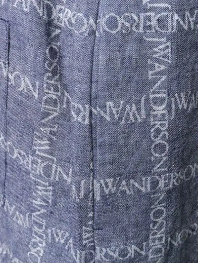 Shop Jw Anderson Logo Grid Print Shorts In Blue