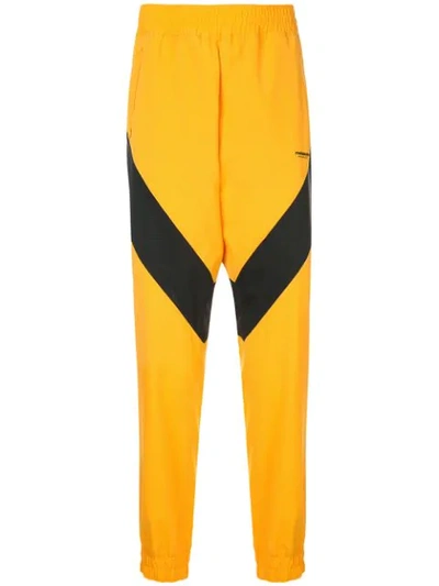 YOSHIOKUBO 条纹细节运动裤 - 黄色