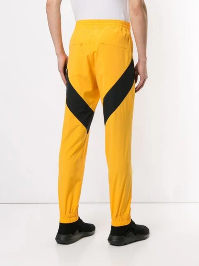 YOSHIOKUBO 条纹细节运动裤 - 黄色