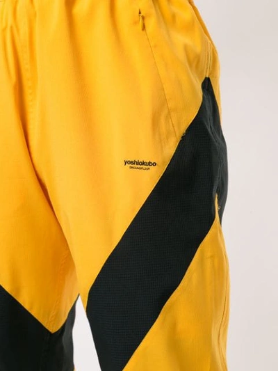 Shop Yoshiokubo Stripe Detail Track Pants In Yellow