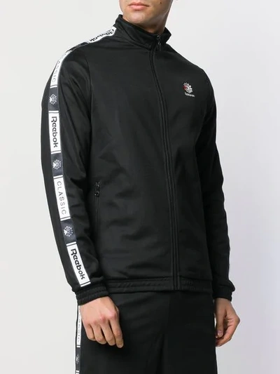 Shop Reebok Logo Print Stripe Sports Jacket - Black