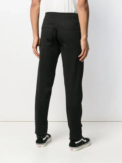 Shop Gcds Logo Stripe Track Pants In Black