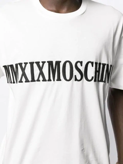 Shop Moschino Logo Embroidered Oversized T-shirt In White