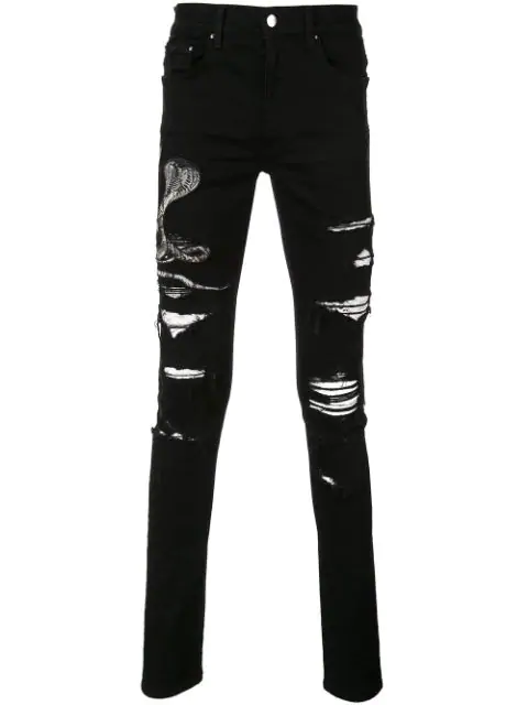 black amiri jeans with snake